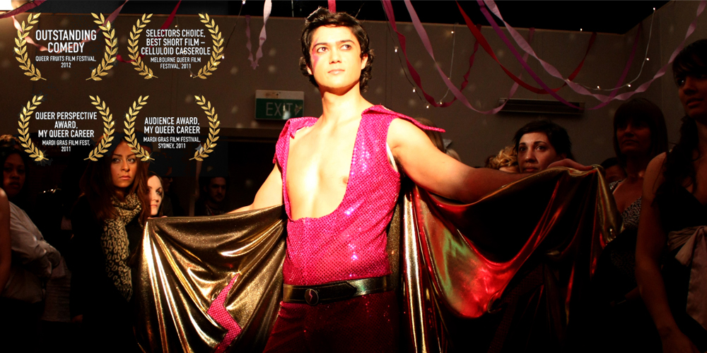 actor poses in a cape
