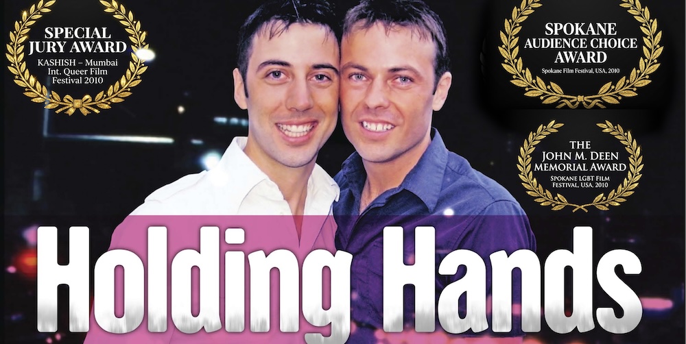 two men standing next to each other